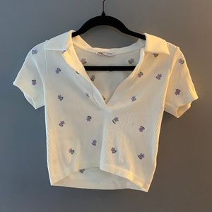 Seamless embroidered floral polo